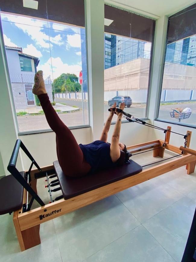 Exercício no Reformer Kauffer no Essence Studio